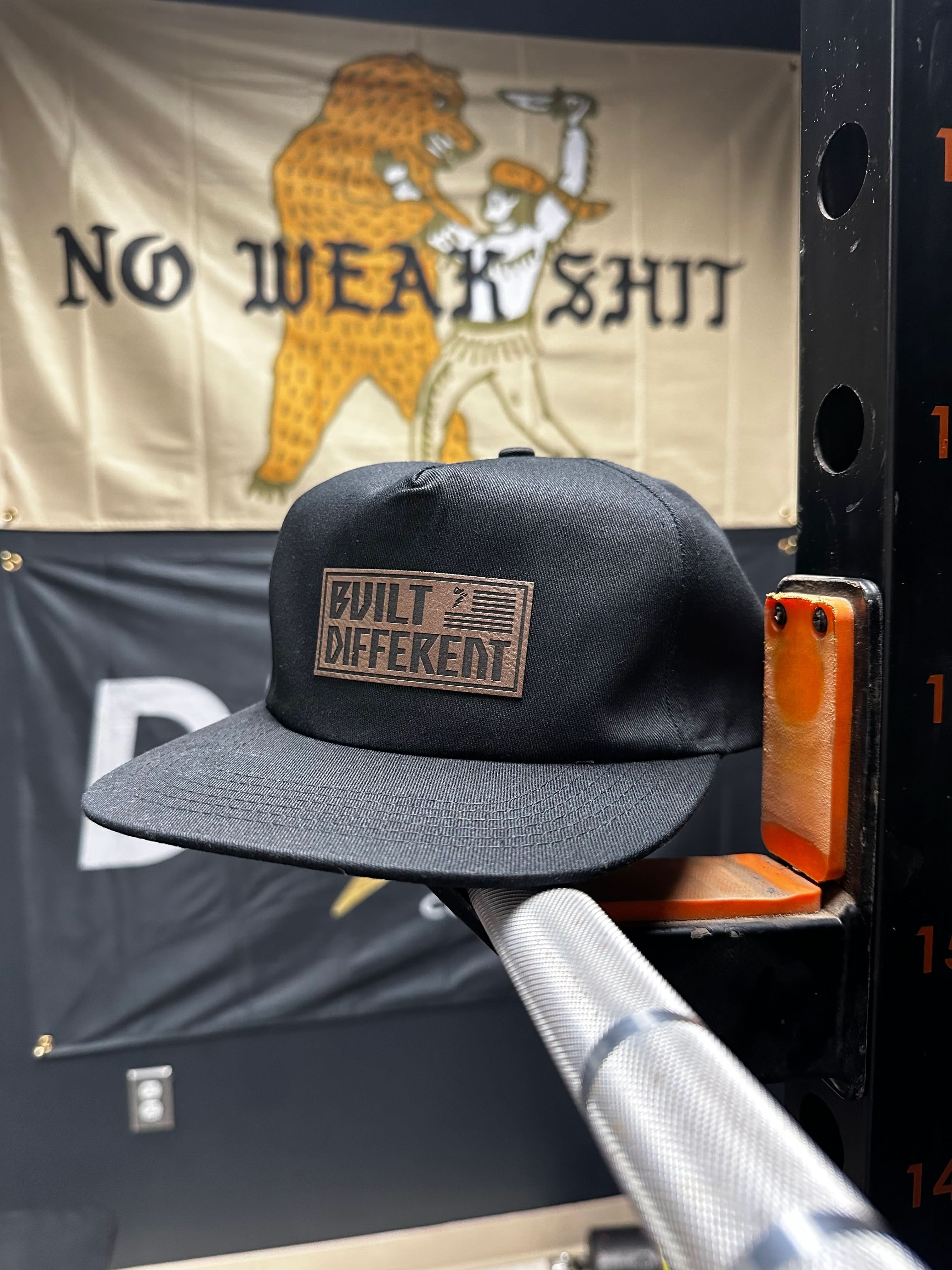 Built Different Patch Snapback Hat - We Defy The Norm